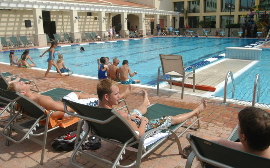 Sailors and their families enjoy an afternoon at what was then a new NAS Sigonella base pool in 2005. The base in Sicily recently celebrated its 65th anniversary.