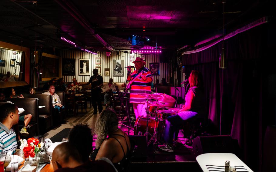 The Ralphe Armstrong Trio performs at Baker’s Keyboard Lounge. The venue claims to be the longest-running jazz club in the world.