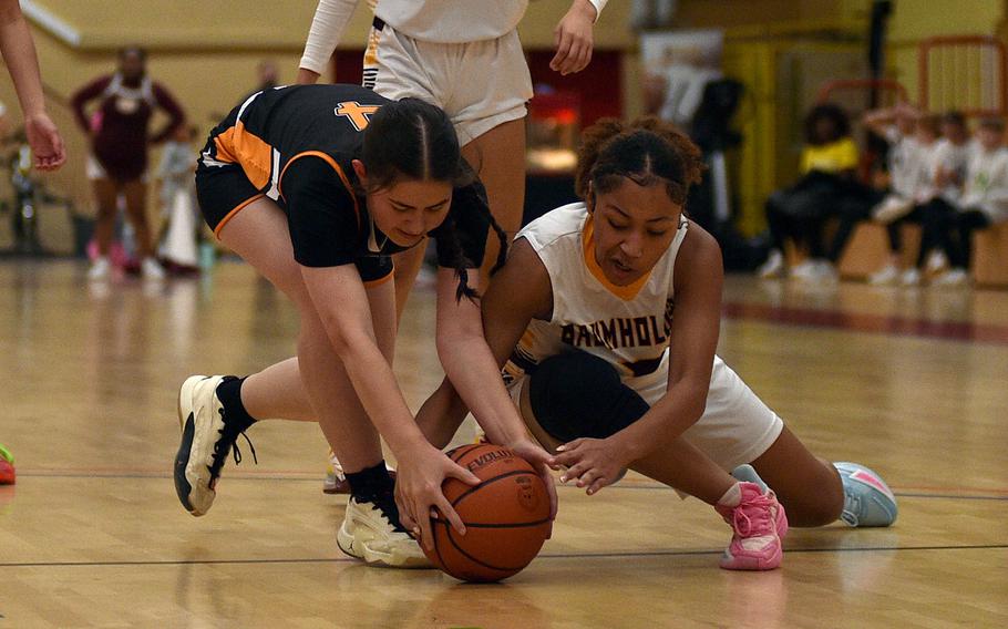 Alyssa Farmakis and Vahna Talikschwil fight for the ball.