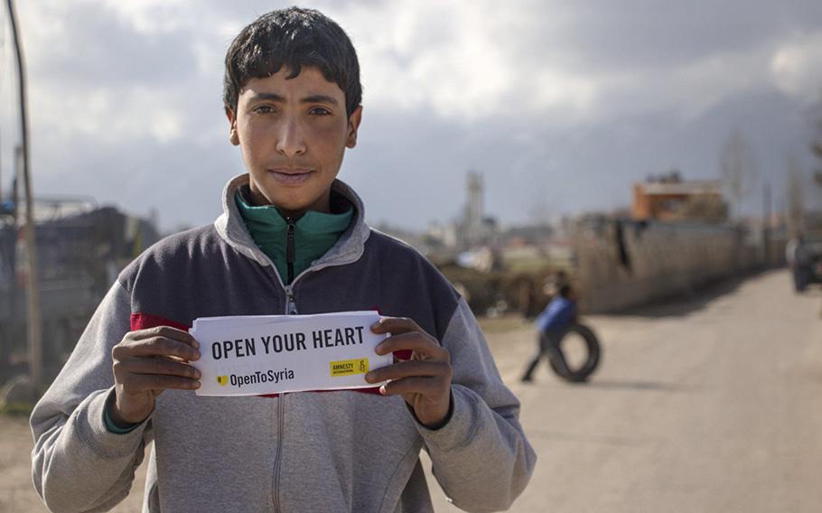 A December 2015 post shows a youth holding a sign urging people to open their hearts to refugees. The post added that refugees from Syria are also struggling to survive in Lebanon, Jordan, Turkey, Iraq and Egypt.