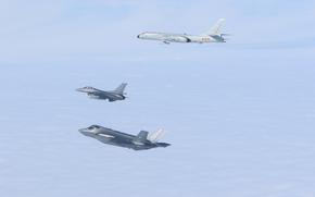 Two CF-18 Hornets, two F-35 Lighting II, and two F-16 Fighting Falcons fighter aircraft from NORAD positively identified and intercepted two Russian TU-95 and two PRC H-6 military aircraft operating in the Alaska Air Defense Identification Zone (ADIZ) on July 24, 2024. NORAD employs a layered defense network of satellites, ground-based and airborne radars and fighter aircraft in seamless interoperability to detect and track aircraft and inform appropriate actions. NORAD remains ready to employ a number of response options in defense of North America. (Department of Defense Photo)