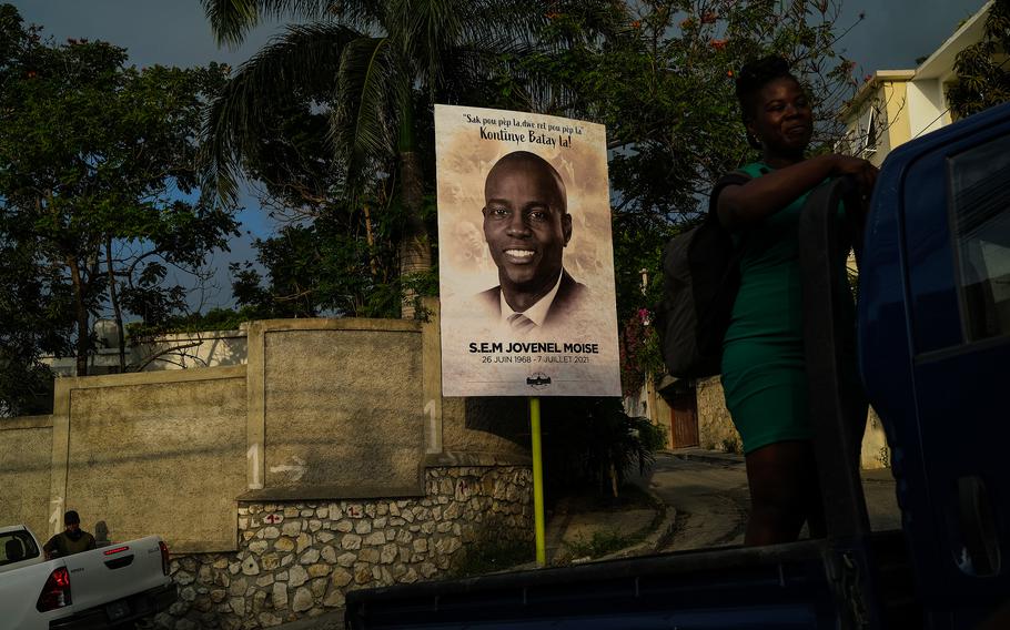 A photo in Port-au-Prince memorializes Haitian President Jovenel Moïse on July 21, two weeks after his assassination. 