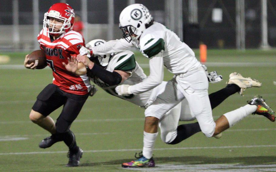 Derek Ulrich tries to avoid being tackled.