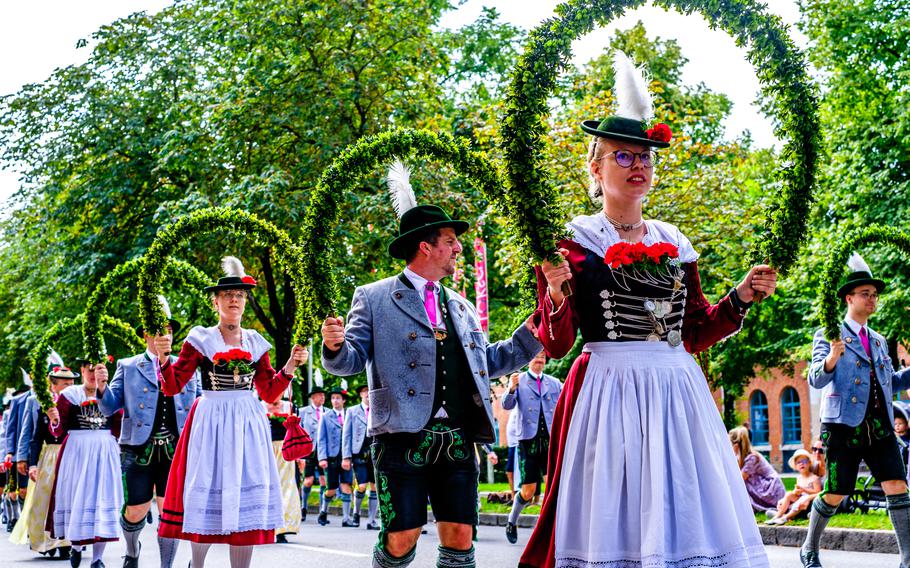 Residents participate in a traditional parade in 2023 at the Herbstfest Rosenheim celebration in Rosenheim, Germany. This year’s festivities run from Saturday to Sept. 15.