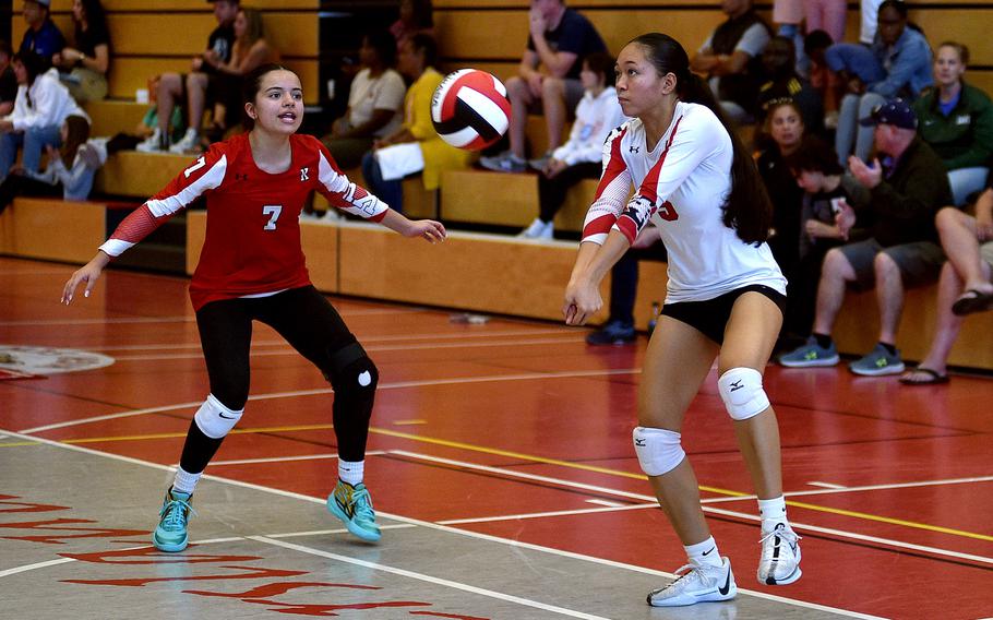 Kaiserslautern's Kezley Kai bumps the ball while teammate Marisa Branch watches during a match against Wiesbaden on Sept. 21, 2024, at Kaiserslautern High School in Kaiserslautern, Germany.