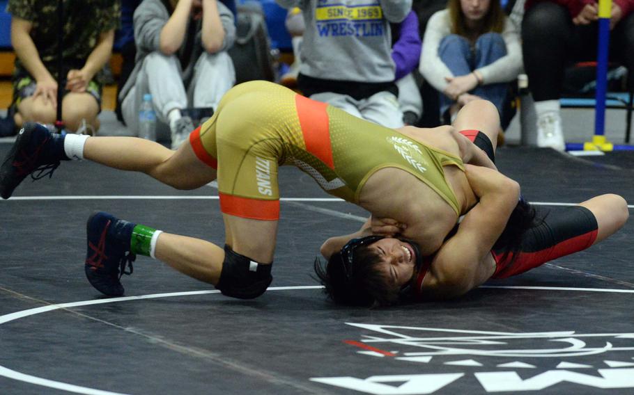 Gavin Caddali tries to put Ryan Murase on his back.