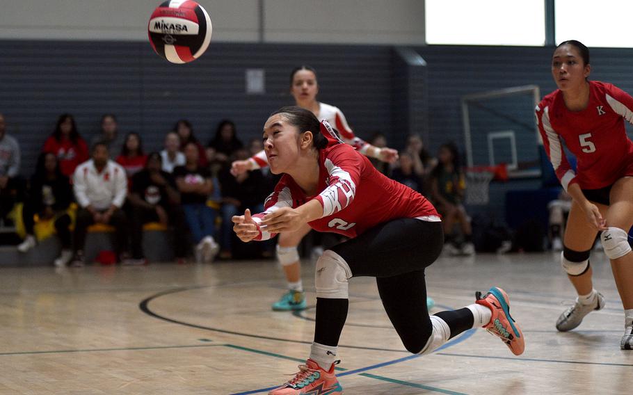 Bianca Ocampo digs out a ball.