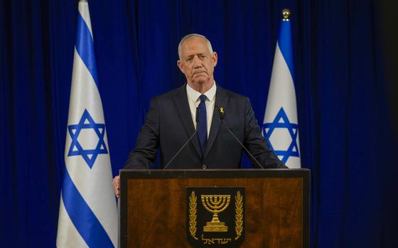 Benny Gantz, a centrist member of Israel's three-member War Cabinet delivers a statement in Ramat Gan, Israel, Sunday, June 9, 2024. (AP Photo/Ohad Zwigenberg