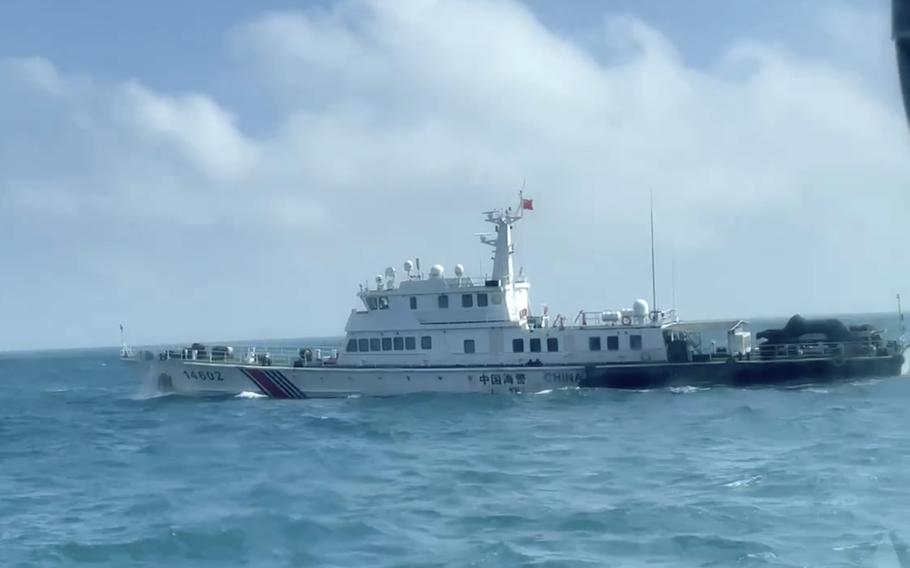 A Chinese Coast Guard boat sails in the sea.