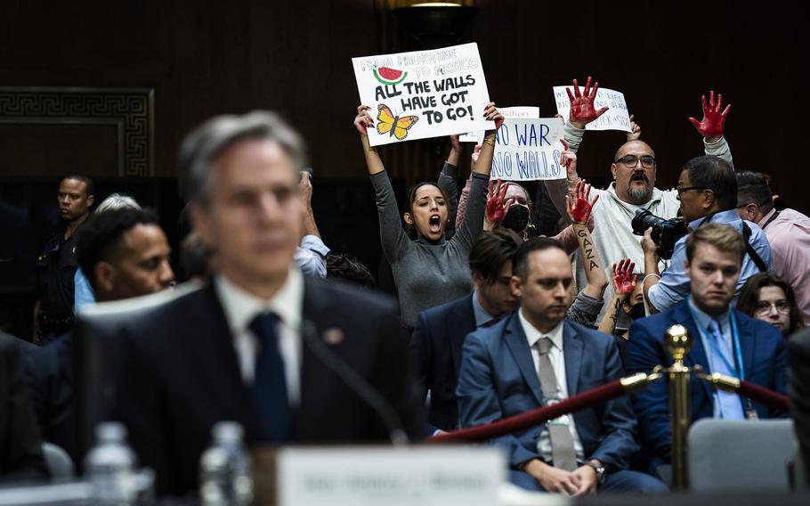 Activists protest war in Gaza on Oct. 31, 2023, when Secretary of State Antony Blinken and Defense Secretary Lloyd Austin testified during a Senate Appropriations Committee hearing in Washington about the United States sending aid to Israel and Ukraine. 