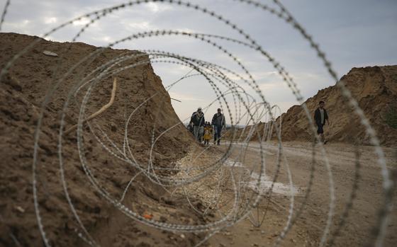 Displaced Palestinians make their way from central Gaza to their homes in the northern Gaza Strip, Monday, Feb. 10, 2025. (AP Photo/Jehad Alshrafi)