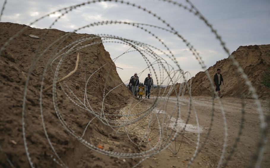 Displaced Palestinians make their way from central Gaza