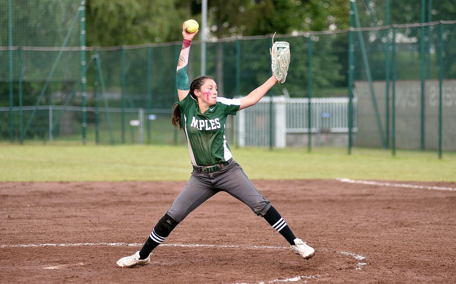 Naples ace Ariana Lopez throws to the plate during the Division II/III DODEA European softball championship game against Rota on May 24, 2024, at Kaiserslautern High School in Kaiserslautern, Germany.