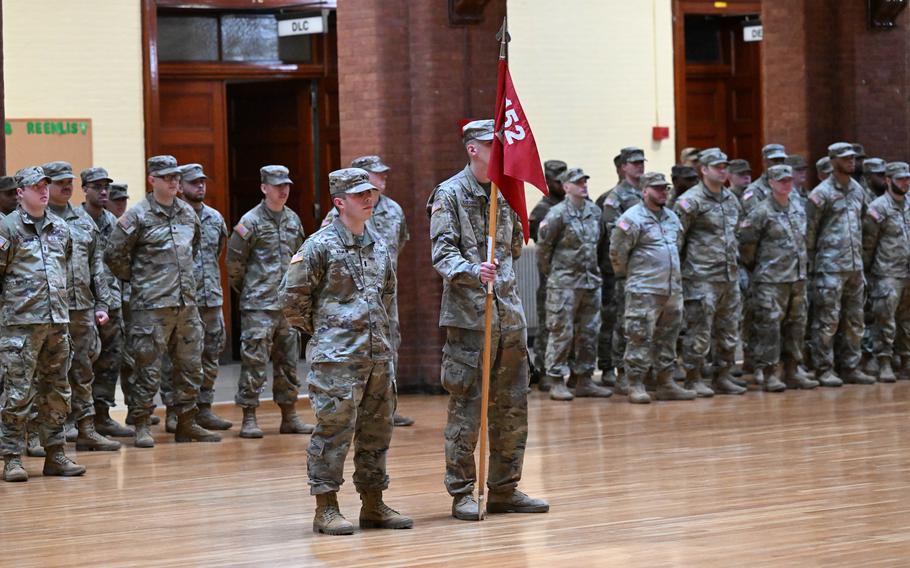 Soldiers stand in formation