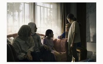A 42-year-old woman and four of her six daughters gather in their apartment in a suburb of Cairo. “People here are so kind to us,” said one of the girls, but it’s a “new life — it’s hard.” 