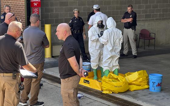 A hazmat crew from the National Guard's Civilian Support Team investigates after a suspicious package was delivered to election officials at the Missouri Secretary of State's office in Jefferson City on Sept. 17, 2024.