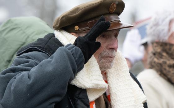 Battle of the Bulge U.S. veteran David Marshall salutes during a ceremony in Bastogne, Belgium, Dec. 14, 2024, to mark 80 years since the famed World War II engagement.