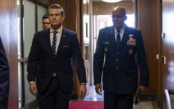 Defense Secretary Pete Hegseth walks with Chairman of the Joint Chiefs of Staff Gen. CQ Brown Jr. at the Pentagon in Washington on Jan. 27, 2025. Hegseth will attend the NATO defense ministers meeting in Brussels on Thursday.