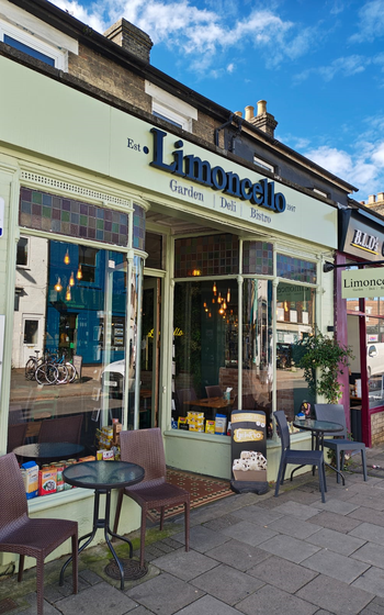 The green entrance of the Limoncello stands out from the surrounding shops, drawing in patrons. Limoncello is a family-owned restaurant in Cambridge that started in 1977. 