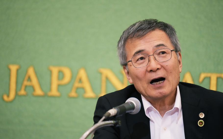 Hideyo Ogawa speaks during a news conference