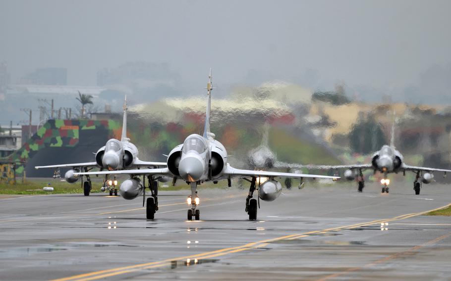 Taiwan fighter jets taxi at Hsinchu Air Base.