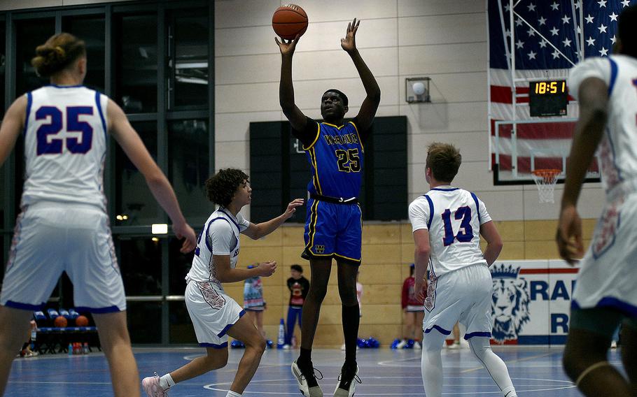 Joel Idowu shoots from long range.