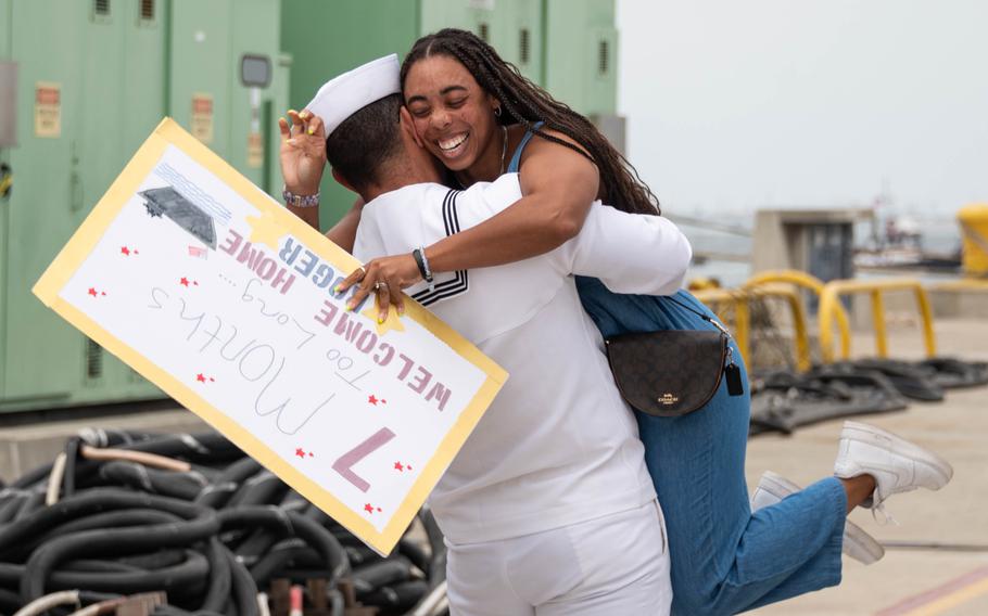 Sonar Technician (Surface) 3rd Class Roger A. Rodriguez assigned to the Arleigh Burke-class guided-missile destroyer USS Halsey (DDG 97) reunites with his wife during the ship’s homecoming at Naval Base San Diego, Aug. 16, 2024. 