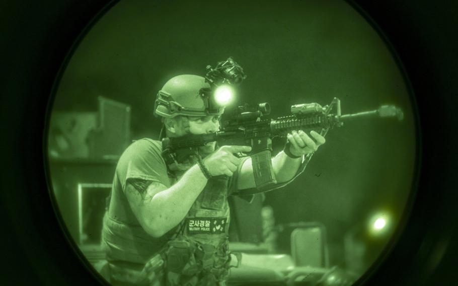 Airman 1st Class Tylor Chism of the 51st Security Forces Squadron engages simulated combatants during an Ulchi Freedom Shield drill at Osan Air Base, South Korea, Aug. 20, 2024. 