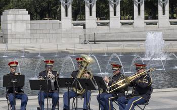The U.S. Army Brass Quintet plays at the 20th anniversary celebration of the National World War II Memorial in Washington, D.C., May 25, 2024.