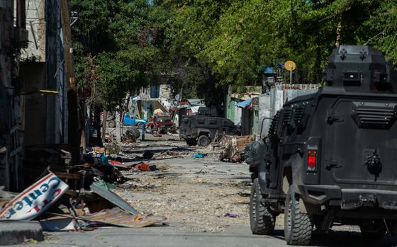 Police patrol around Bernard Mevs Hospital, where armed gangs have spread violence, in Port-au-Prince, Haiti, on Dec. 17, 2024. (Clarens Siffroy/AFP/Getty Images/TNS)