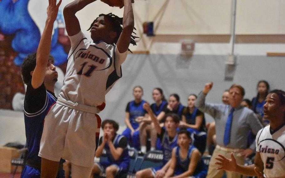 Bryson Russell puts up a jump shot.