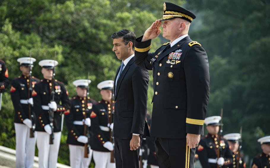United Kingdom Prime Minister Rishi Sunak (left) and Maj. Gen. Trevor J. Bredenkamp (right) participate in an Armed Forces Full Honors Wreath-Laying Ceremony at the Tomb of the Unknown Soldier at Arlington National Cemetery, Arlington, Va., June 7, 2023. 