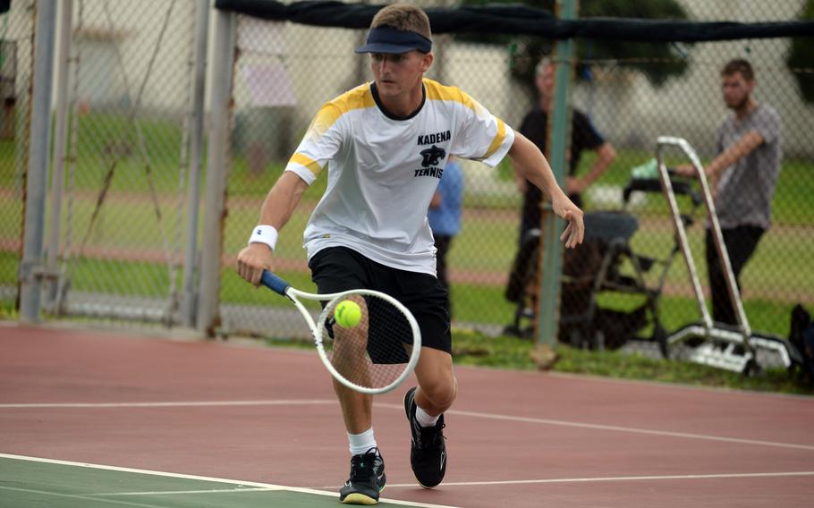 Micah Berry plays tennis.