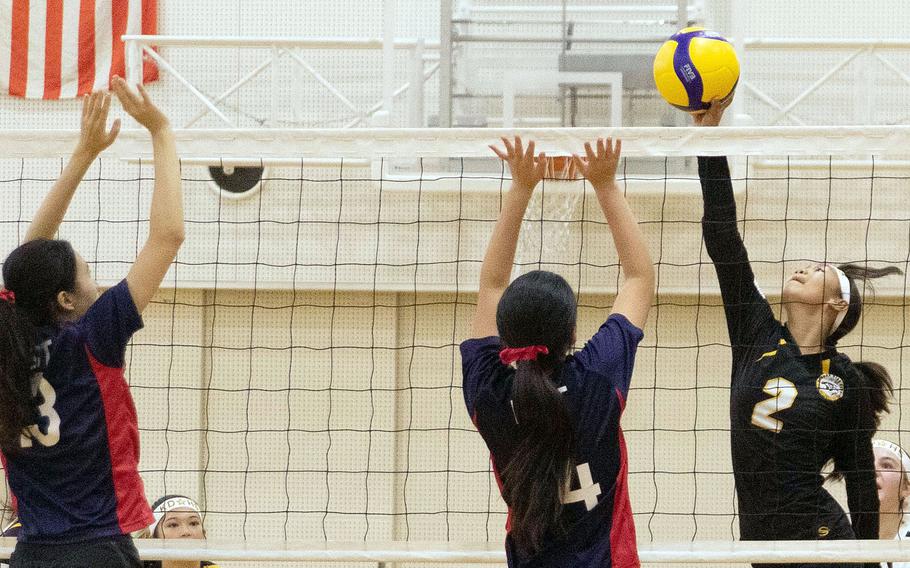 Kadena's Jazlene Vergara spiikes against British School Tokyo during Thursday's American School In Japan YUJO Tournament match. The Panthers won in straight sets.