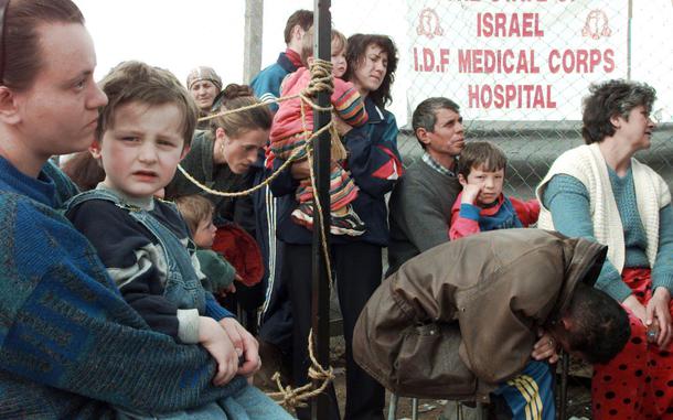 The line is long to receive medical attention at the Israeli Defense Force hospital inside the Brazda Refugee Camp, April 16, 1999. The medical facility consists of tents and have treated approximately 1,200 patients so far.