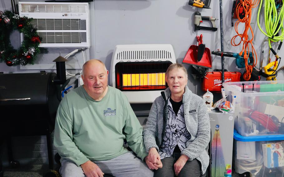 John and Joan Reichart in their garage. 