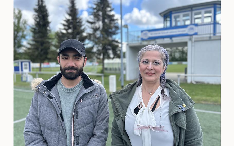 Syrians Anas Alharerei and Hanan Baghdadhi at the SV Blau Weiss ‘90 sport club in Neustadt an der Orla, Germany, where they work under a pilot program for asylum seekers.