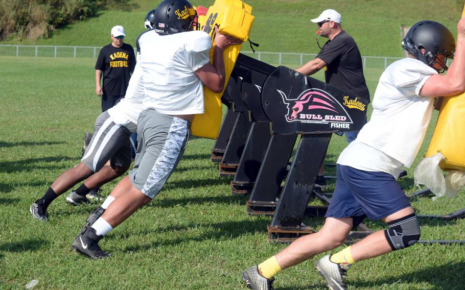 Kadena players hit the blocking sleds on the second day of practice Thursday, Aug. 10, 2023. The Panthers are the reigning DODEA-Japan champions and won the last Far East Division I title game four years ago.