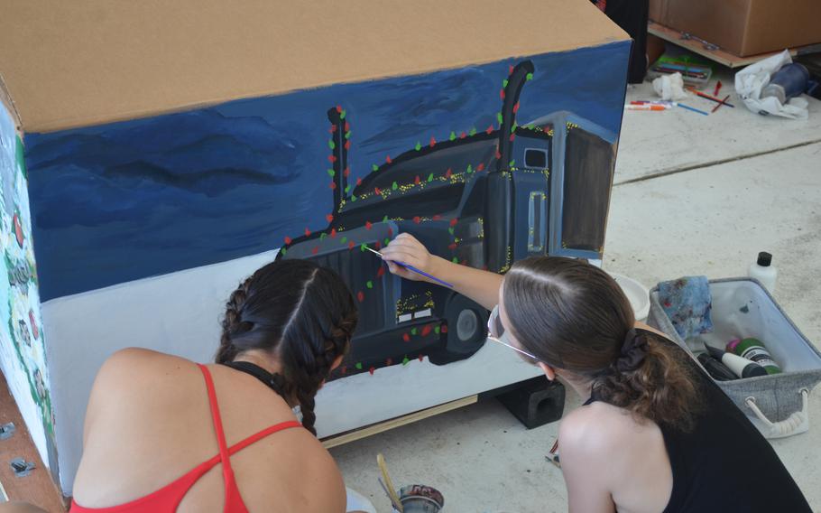 Volunteers decorated the supply boxes during the “Bundle Build” at Andersen Air Force Base.