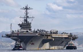 The aircraft carrier USS Harry S. Truman arrives at the NATO Marathi Pier Complex in Souda Bay, Crete, during a port visit on Feb. 6, 2025. Naval Support Activity Souda Bay is supporting ships with the Truman Carrier Strike Group, which arrived after two months of combat operations in the Middle East.