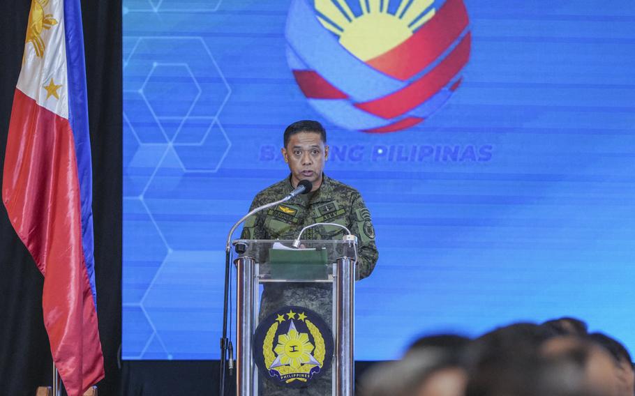 In this handout photo provided by the Malacanang Presidential Communications Office, Philippine military chief Gen. Romeo Brawner Jr. talks during a conference at Camp Aguinaldo military headquarters in Quezon City, Philippines on Thursday July 4, 2024. Philippine forces would defend themselves with “the same level of force” if they come under assault again from China’s coast guard in the disputed South China Sea where Chinese personnel armed with machetes and spears injured Filipino navy men and damaged two of their boats in a chaotic faceoff last month, the Philippine military chief warned Thursday. 