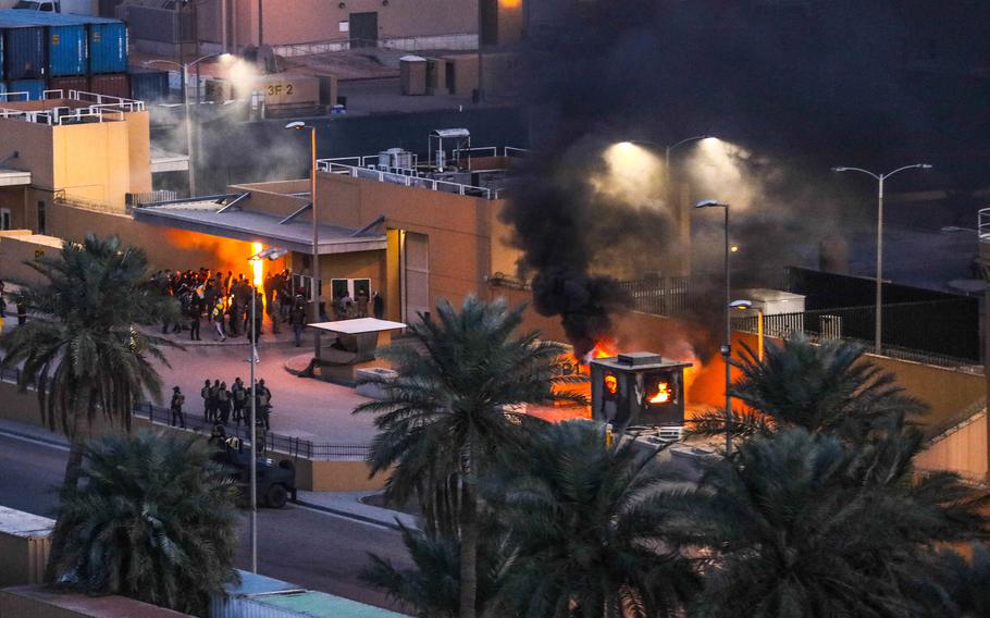 Attackers set fire to an entry control point at the U.S. Embassy in Baghdad, Iraq, Dec. 31, 2019. A State Department Inspector General report recently said that damages to the embassy totaled $35 million.
