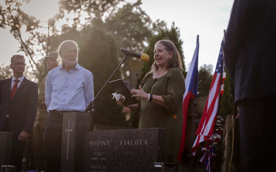 Kellylynn Charles, the great-niece of a pilot killed in action during the Battle over the White Carpathians, gives a speech at her great-uncle's grave in Rudice, Czech Republic, on Aug. 31, 2024.