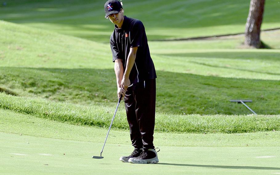 Spangdahlem golfer Cameron Lewis putts on the No. 18 hole at Woodlawn Golf Course on Ramstein Air Base, Germany, on Spet. 28, 2023.