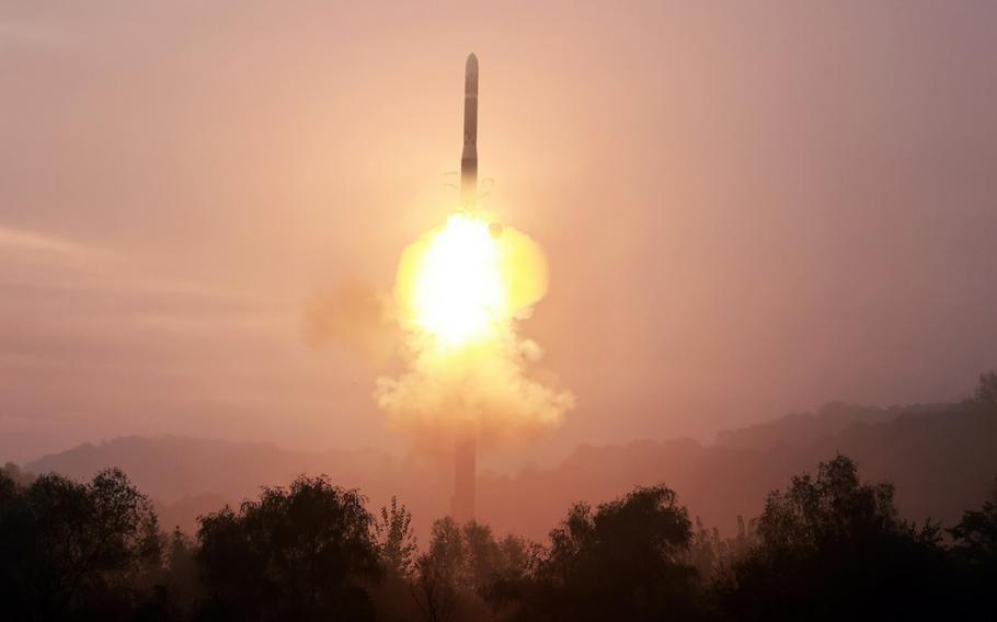 An intercontinental ballistic missile is launched into the sky.