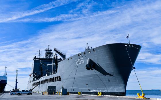 USNS John Lewis (T-AO 205) sits pierside at Naval Surface Warfare Center, Port Hueneme Division (NSWC PHD), Friday, Nov. 4. The U.S. Navy fleet replenishment oiler, delivered to Military Sealift Command in July, is in the beginning months of its year-long ship qualification trials schedule and stopped by NSWC PHD for a stores resupply and minor repairs by builder representatives. The Underway Replenishment (UNREP) fuel and cargo delivery stations aboard the civilian-crewed ship use the new Electric Standard Tensioned Replenishment Alongside Method (E-STREAM) technology, designed by NSWC PHD UNREP engineers. USNS John Lewis is the first oiler to have the new E-STREAM systems on board, and the command’s UNREP team members were excited to see in person the system installed on a ship. (U.S. Navy photo by Dana Rene White/Released)