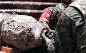 Japanese soldiers disarm World War II-era ordnance in Naha city, Okinawa, Sept. 29, 2024, in this screenshot from a Japan Ground Self-Defense Force video. 