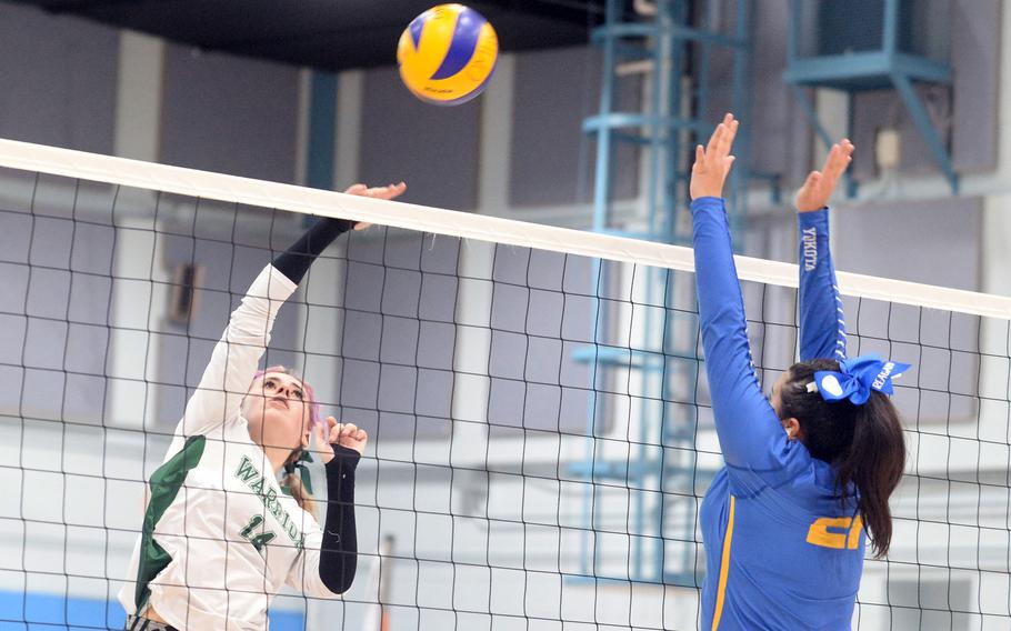 Yokota and Daegu square off in girls volleyball.