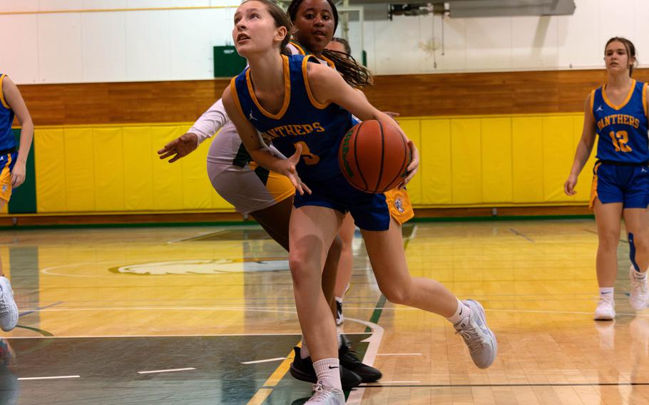 Molly Bogdan drives to the basket.