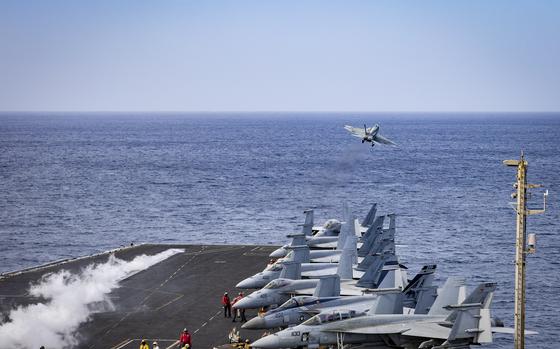 An F/A-18E Super Hornet launches from the USS Harry S. Truman on Dec. 28, 2024 in the Red Sea. Navy ships and aircraft attacked Houthi weapons facilities in Yemen on Dec. 30 and 31, according to U.S. Central Command.